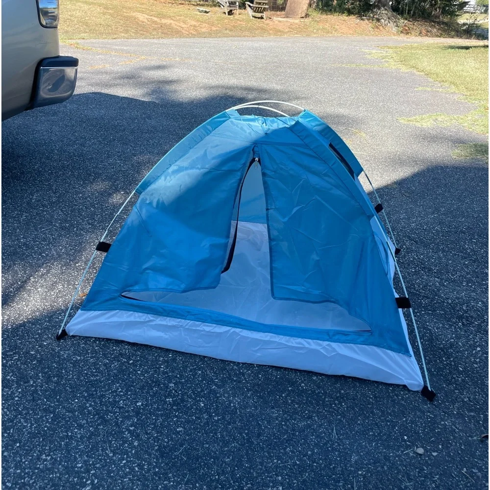 Here is a blue and gray pet tent. It’s very big and nice for an animal.